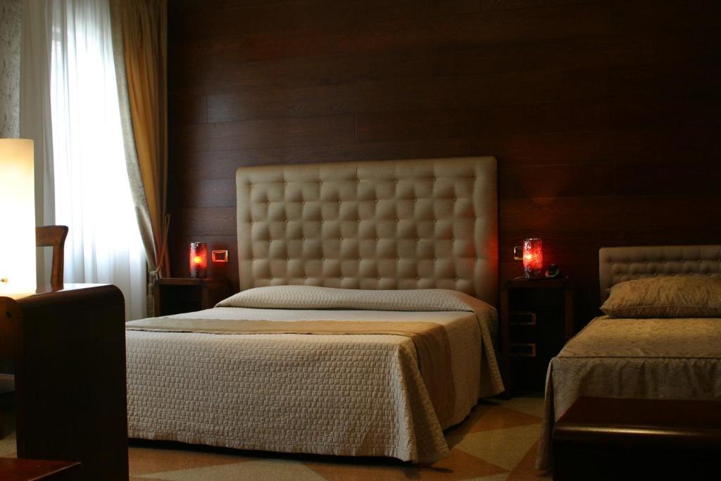 Hotel Abbazia Velence Szoba fotó
